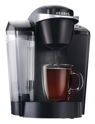Brew a perfect beverage in under one minute with the Keurig K50 Hot Brewing System that offers a choice of three cup sizes with a removable Drip Tray to accommodate travel mugs. (CNW Group/Staples Canada Inc.)
