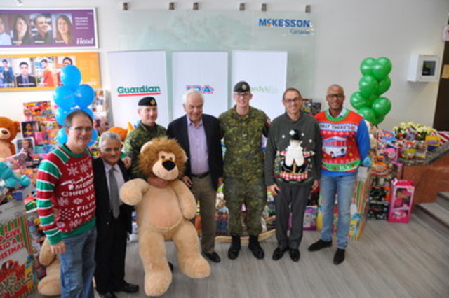 Local pharmacists, McKesson Canada employees and representatives of the Toys for Tots Canada charity were joined by the Honourable John McCallum, Canada’s Minister of Immigration, Refugees and Citizenship. (CNW Group/MCKESSON CANADA)