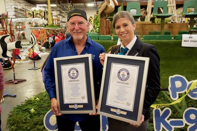 (L-R) Joey Herrick, founder of Lucy Pet Products and Lucy Pet Foundation, and Kim Partrick, Guinness World Record adjudicator display Guinness World Record certificates for longest and heaviest float in history ... Lucy Pet's Gnarly Crankin' K9 Wave Maker 2017 Tournament of Roses Parade float is 126 feet long and weighs 148,250 lbs.