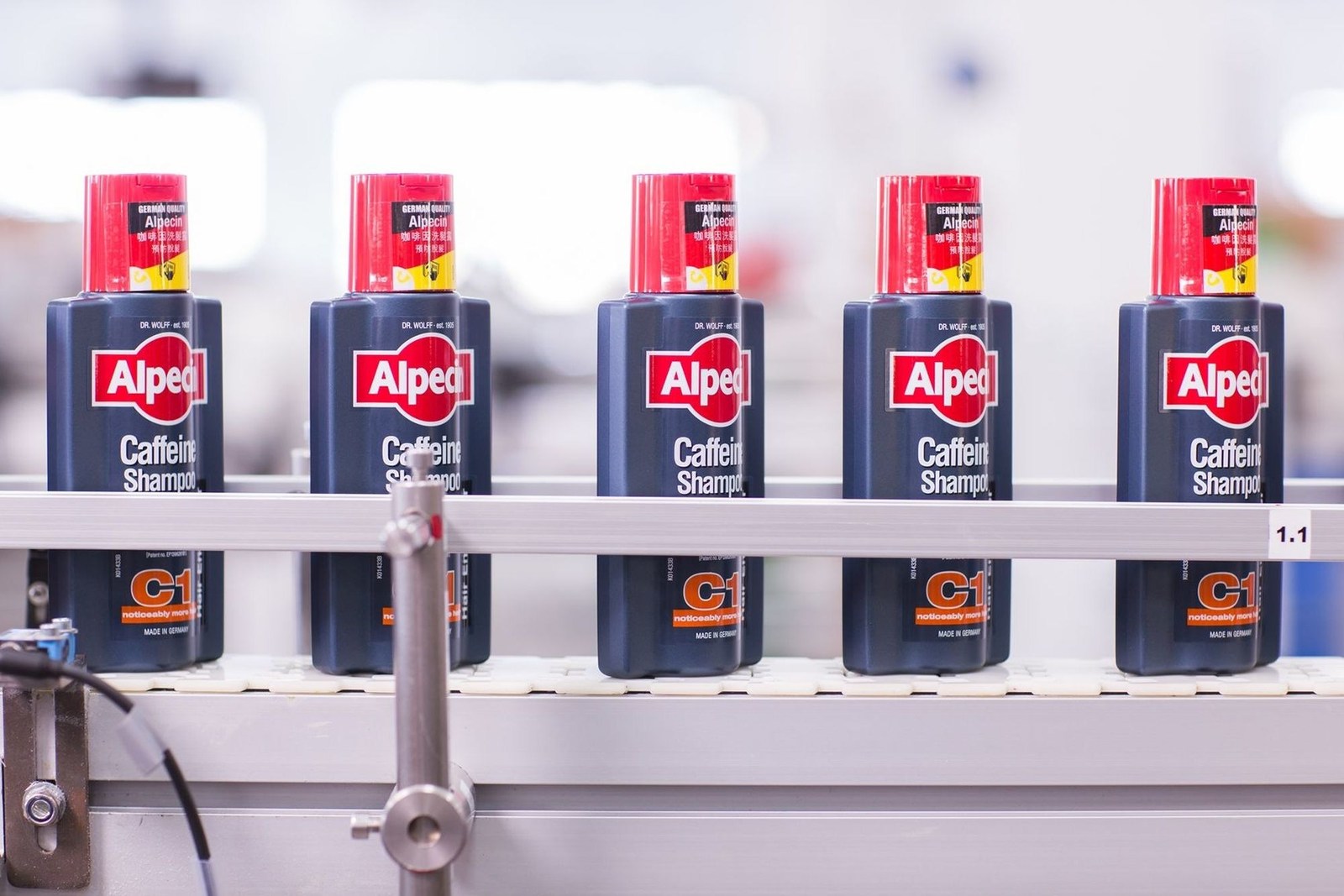 Production of Alpecin caffeine shampoo in Germany with Asian label (PRNewsFoto/Dr. Wolff Group)