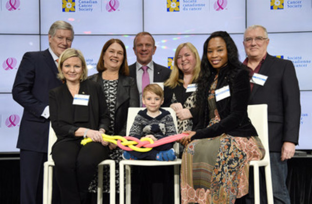 Tying the knot: 5-year-old cancer survivor Jaxson Tugnett (centre) joins cancer survivor and volunteer Nadege St Philippe; Minister of Health, the Honorable Jane Philpott; Peter Gilgan, philanthropist (back centre); cancer researcher Dr John Bell; Canadian Cancer Society CEO Lynne Hudson; CCS Board Chair Robert Lawrie; and Executive Vice President of CIBC Christina Kramer, as they tie a unity knot to celebrate the merger of the Canadian Cancer Society and the Canadian Breast Cancer Foundation. (CNW Group/Canadian Cancer Society (National Office))