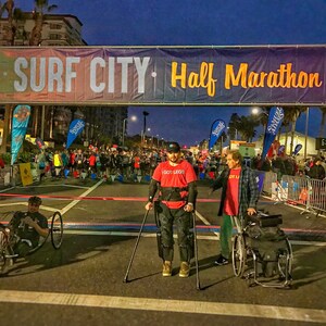 First Paralyzed Man to Walk Across the Finish Line of Surf City USA Marathon &amp; Half Marathon