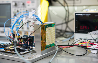 hiSky's 64 element Ka-band phased array receiving antenna during laboratory integration test connected to the digital control test board. The antenna includes the down conversion and operates over the frequency range of 17.7GHz to 20.2GHz. (PRNewsFoto/hiSky)