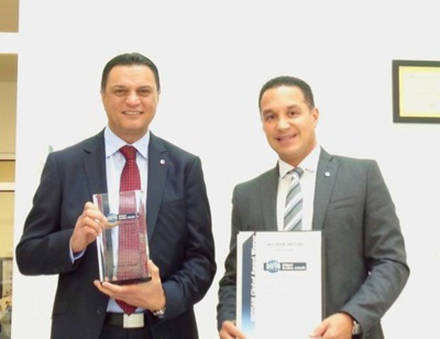 401 Dixie Nissan was awarded the prestigious Nissan Global Award, presented by Nissan Motor Company to General Manager Sohail Iqbal (left) and Regional Director Omar Khan (right). (CNW Group/Dilawri Group of Companies)