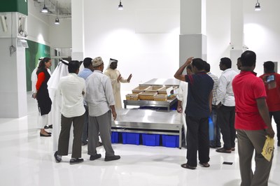 Traders getting a tour of the new market (PRNewsfoto/GEM Global Event Management)