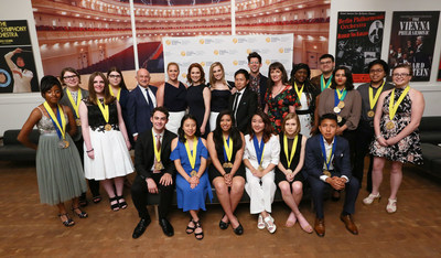 Pictured from center left to right, CEO and President of Scholastic, Richard Robinson, actress and comedian Amy Schumer, actor Ellie Kemper, actor Allison Williams (Girls & Get Out), artist Paul Chan, Awesomeness TV host Hunter March and Executive Director of Alliance for Young Artists & Writers, Virginia McEnerney, pose with the 2017 Gold Medal Portfolio recipients at the National Ceremony for the 2017 Scholastic Art & Writing Awards held at Carnegie Hall, New York, N.Y., Thursday, June 8, 2017