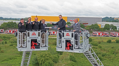 Symbolic key hand-over to the Junta Nacional de Cuerpos de Bomberos de Chile (JNBC). From left to right: Erik Oyarzo - Vicepresidente JNBC, Marcelo Zúñiga - Vicepresidente JNBC, Raúl Bustos - Secretario Nacional JNBC, Raúl Morales - Vicepresidente JNBC, Marc Diening - CEO Magirus, Roland Müller - Sales Direktor Magirus. (Copyright: Magirus) (PRNewsfoto/Magirus)