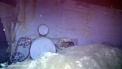 An image shot from a remotely operated vehicle shows wreckage which appears to be one of the two anchor windlass mechanisms from the forecastle of the ship.? Note the star-emblazoned capstans in this photo dated July 12, 1945 just weeks before the ship was lost. Photo courtesy of Paul G. Allen