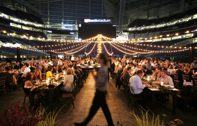 To kick off football season and celebrate its founding partnership with the Minnesota Super Bowl Host Committee, Schwan's Company transformed U.S. Bank Stadium into a 'Feast on the Field' -- a culinary celebration for local business leaders, sports legends, customers, and media on Thursday, Sept. 14, 2017, in Minneapolis. (Andy Clayton-King/AP Images for Schwan's Company)