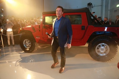 Arnold Schwarzenegger in front of the world's first electrified Hummer H1 at the opening of the Kreisel Electric high-tech research and development center (Copyright: Martin Hesz / Kreisel Electric) (PRNewsfoto/Kreisel Electric)