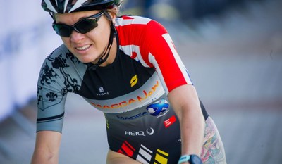 Lucy Richardson, member of the MaccaNow relay team, wearing the high-tech tri-suit with HeiQ's secret versatile finishing technology (PRNewsfoto/HeiQ Materials AG)