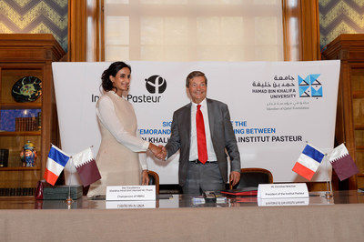 HE Sheikha Hind bint Hamad Al Thani with Christian Bréchot following the signing of the MoU (PRNewsfoto/Hamad bin Khalifa University)