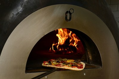 Winner: Zerodegrees – a shot of the pizza going into the wood fired pizza oven (PRNewsfoto/Zerodegrees)