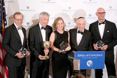 Rabbi Arthur Schneier, (second from right) president and founder of the Appeal of Conscience Foundation presents the 2019 World Statesman Award to Lee Hsien Loong, the Prime Minister of Singapore (second from the left). The 2019 Appeal of Conscience Awards were presented to Stephen Ross, the Chairman and Founder of Related Companies (left), Susan Wojcicki, the Chief Executive Officer of YouTube (center), and Timotheus Httges, the Chief Executive Officer of Deutsche Telekom AG (right). The World Statesman Award honors leaders who support peaceful coexistence and mutual acceptance in multiethnic societies. The Appeal of Conscience Award is presented to visionary business executives with a sense of social responsibility who use their resources and vast reach across boundaries to better serve the global community.