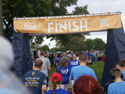 Members of the Olympus team cross the finish line of the Colon Cancer Coalition’s Get Your Rear in Gear Boston race, which raised awareness of and encouraged screening for colon cancer, the nation’s second-leading cancer killer. As part of its 100th Anniversary initiatives, Olympus Corporation of the Americas was the presenting sponsor of this event.