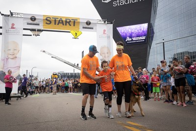St. Jude patient Gabe takes his first steps since treatment with support from his mother Andrea and four-time supercross champion Ryan Dungey at St. Jude Walk/Run Twin Cities. St. Jude patient Gabe takes his first steps since treatment with support from his mother Andrea and four-time supercross champion Ryan Dungey at St. Jude Walk/Run Twin Cities.