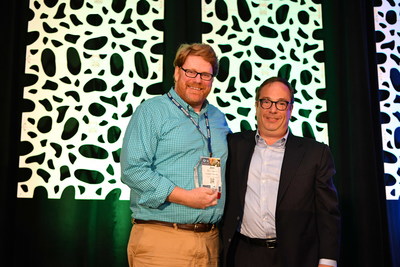 Jim McCorkell (left) standing beside the College Possible board chairman Steve Smith after winning the National College Access Network's 2019 Executive Leadership Award of Excellence. Photo courtesy of National College Access Network