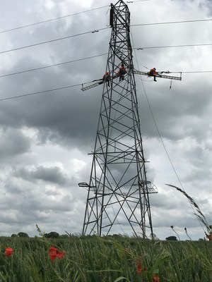Smart Wires technology being installed by UK Power Networks on high voltage cables near Colchester in Essex, England.