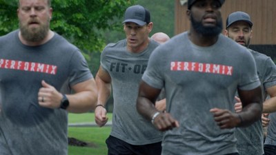 John Cena works out with U.S. veterans at a FitOps Camp. John Cena works out with U.S. veterans at a FitOps Camp.