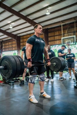 John Cena joins U.S. veterans at a FitOps Camp. John Cena joins U.S. veterans at a FitOps Camp.