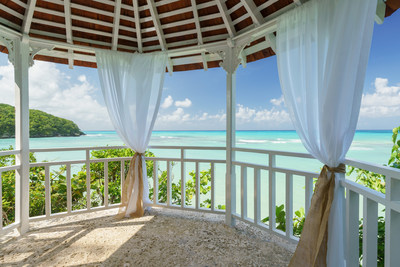 Couples Sans Souci Cliffside Oceanfront Gazebo. Intimate wedding parties of up to 8 guests luxuriate in panoramic views of the Caribbean.