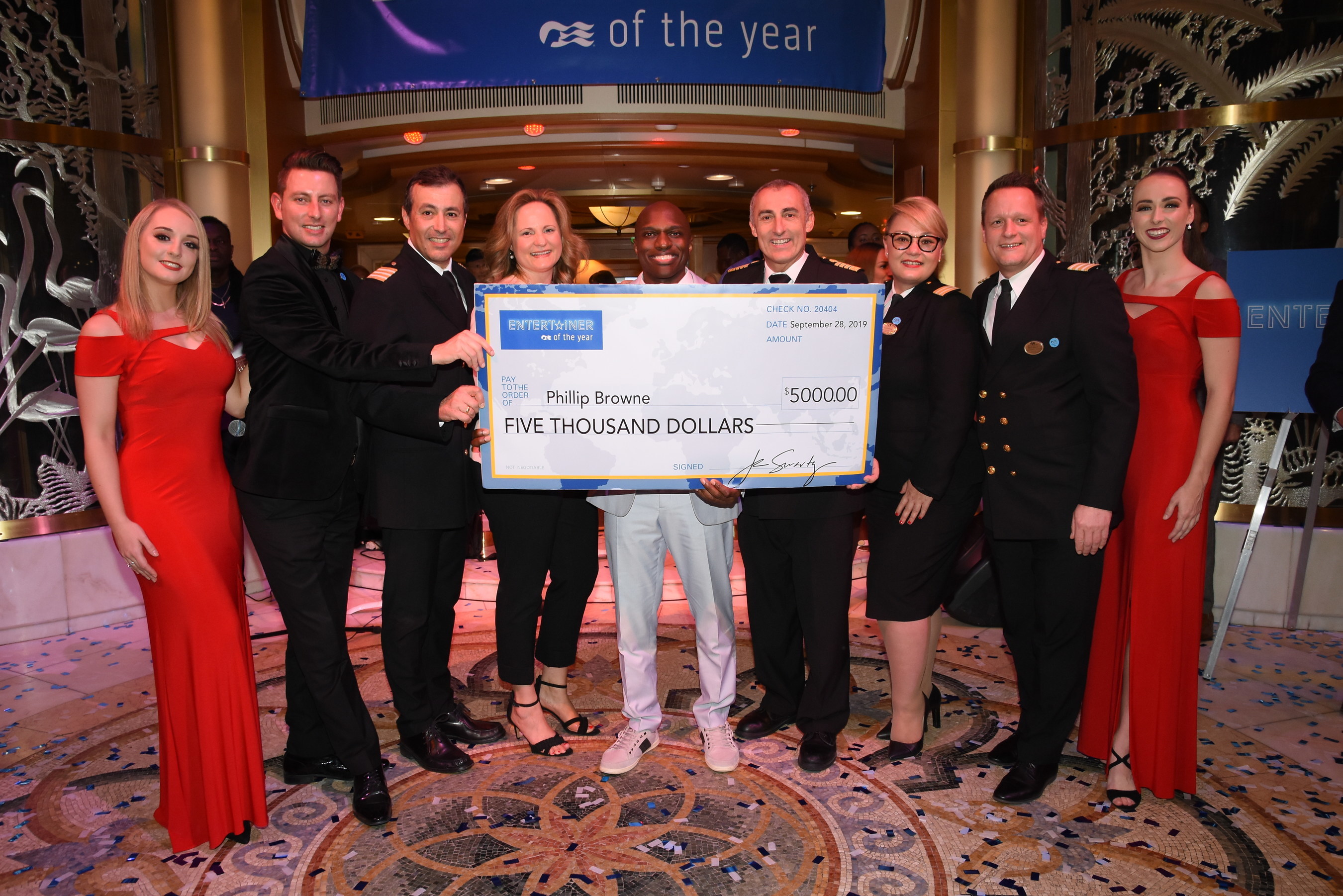 Vocalist Phillip Browne (center) was named Princess Cruises newest Entertainer of the Year onboard Star Princess on September 28, 2019