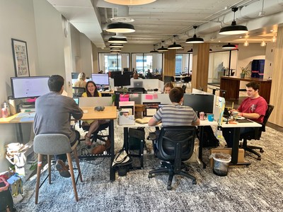 Employees working out of the new TransitScreen headquarters at 750 17th St NW in downtown Washington, DC.