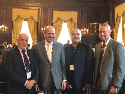 Amir Jafri and David Schlotterbeck with Secretary General of GCC, H.E. Abdullatif bin Rashid Al Zayani From left to right: Hadi Al-Alawi, H.E. Abdullatif bin Rashid Al Zayani, Amir Jafri, David Schlotterbeck