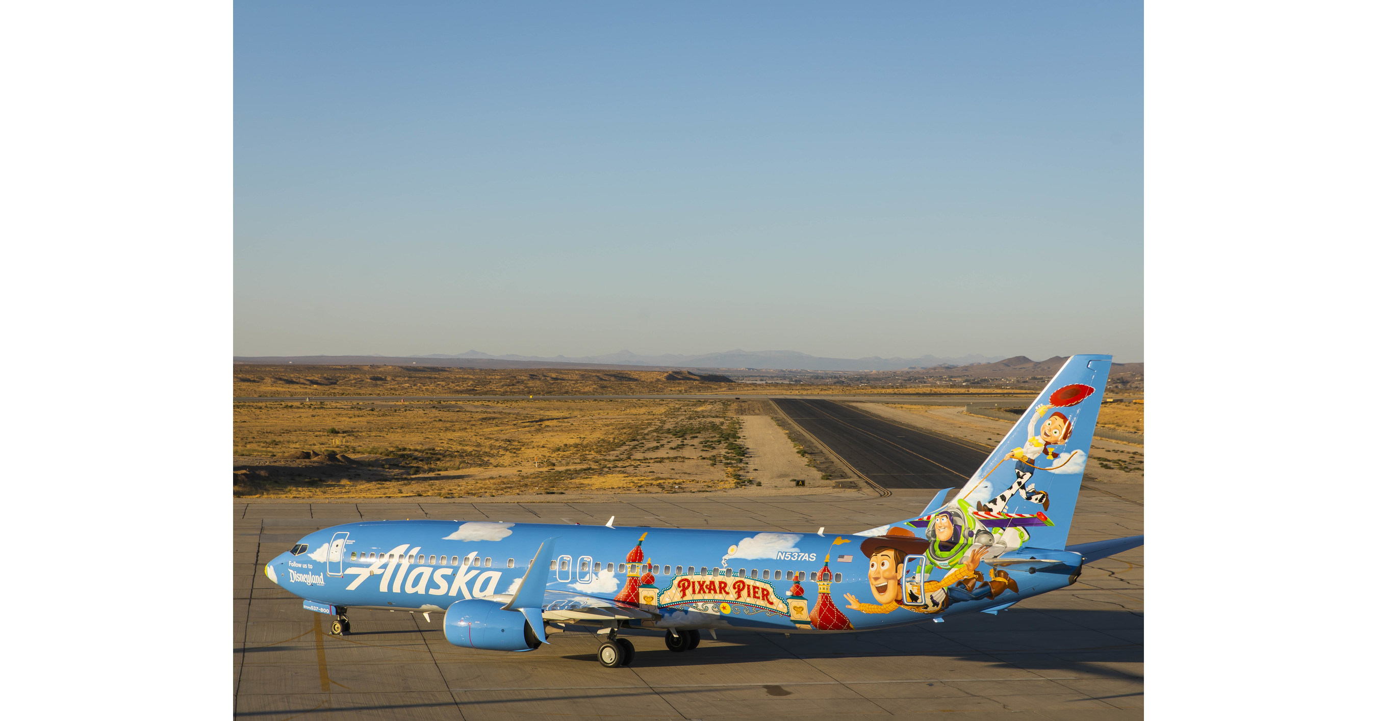 Alaska Airlines Newest Painted Pixar Themed Aircraft Showcases Pixar Pier At Disney California Adventure Park Along With A Few Well Known Faces - american airlines roblox music