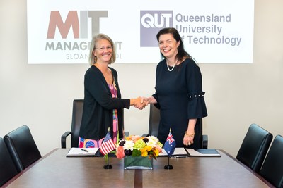 From left to right: Kris Schaefer, Senior Associate Dean of MIT Sloan School of Management, and Robina Xavier, Executive Dean of QUT Business School, kick off a five-year collaboration between the two schools with a signing ceremony held on the MIT Sloan campus. Photo credit: Justin Knight