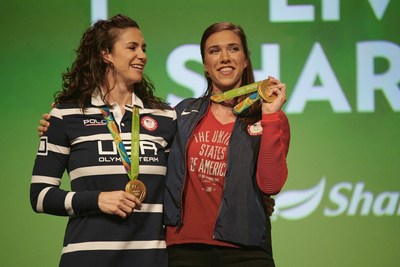 Gold medal rowers Amanda Polk and Amanda Elmore onstage at the Shaklee Global Conference. Gold medal rowers Amanda Polk and Amanda Elmore onstage at the Shaklee Global Conference.