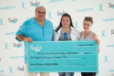 Chris Newcomb, Newk's Eatery CEO and Newk's Cares co-founder, and Madison Newcomb, Newk's Cares co-chair, present a check to Audra Moran, OCRA president, in Jackson, Miss. Chris Newcomb, Newk's Eatery CEO and Newk's Cares co-founder, and Madison Newcomb, Newk's Cares co-chair, present a check to Audra Moran, OCRA president, in Jackson, Miss.