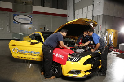 Students work on a high performance engine during their Roush Yates Power & Performance course, which is part of UTI's core automotive program