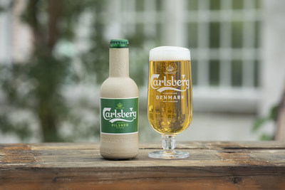 Carlsberg moves a step closer to creating the world’s first ‘paper’ beer bottle. Pictured is a new research prototype for Carlsberg’s Green Fibre Bottle, which contains beer for the first time.