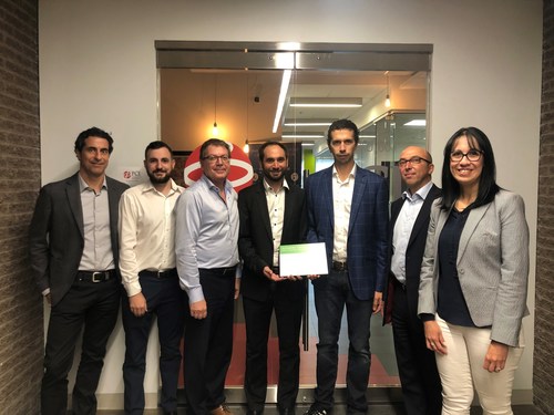 Members from the Schneider Electric team present the EcoStruxureTM System Platform Certification to representatives from PCI Automation Industrielle (PCI). PCI is the first global partner to receive the certification as part of Schneider Electric’s Alliance Partner Program. (CNW Group/Schneider Electric Canada Inc.)