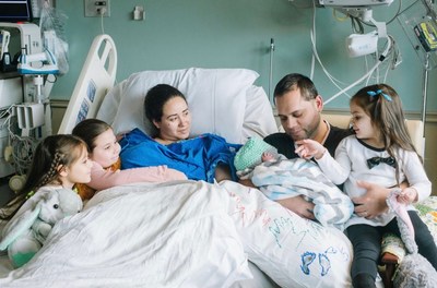 The Santa Maria family with baby Lucas soon after his birth.