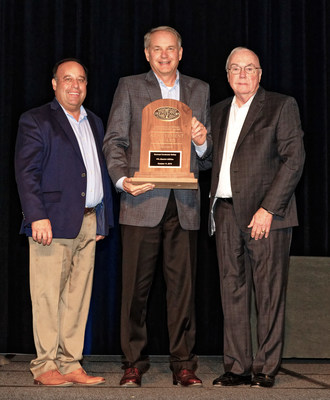 Greg Dudkin, President of PPL Electric Utilities (Center), was presented the 2019 AEIC Achievement Award for PPL's Downed Conductor Safety Project by Manny Miranda, President of AEIC and SVP, Power Delivery of Florida Power & Light Co. (L), and Terry Waters, Executive Director of AEIC (R).
