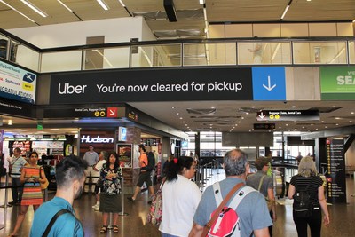 Airport signage guides passengers from their arrival at Sea-Tac through to their ground transportation.