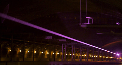 Captured by a special camera, a laser beam invisible to the naked eye shoots across the dark expanse of the David Taylor Model Basin at the Naval Surface Warfare Center in Bethesda, Maryland. (U.S. Navy) Captured by a special camera, a laser beam invisible to the naked eye shoots across the dark expanse of the David Taylor Model Basin at the Naval Surface Warfare Center in Bethesda, Maryland. (U.S. Navy)