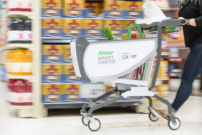 Sobeys rolls out the first intelligent shopping cart, called the Sobeys Smart Cart, to Canadian grocery stores today at the grocer's Glen Abbey Sobeys location in Oakville, Ontario. (CNW Group/Sobeys Inc.)