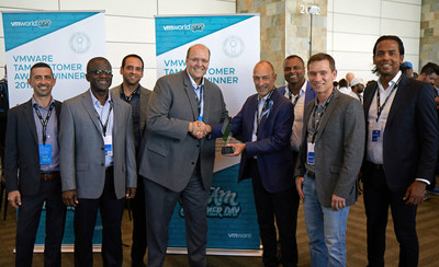 Pictured with TAM Global Vice President Alan Barber (center right) and VITAS' VMWare TAM Mike Nagy (far left) is CIO Patrick Hale and his team: Ainsworth Palmer, Adam Alicea, Naresh Samlal, Alvaro Ochoa and Alejandro Mateo.