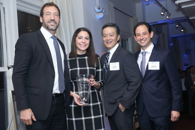 Aliso Fazio accepts the NYPACE Distinguished Leadership & Service Award on behalf of JPMorgan Chase.  Presenting to Alison, left to right, are Joseph Michalczyk, partner at PricewaterhouseCoopers and member of the NYPACE Host Committee, Executive Director Ken Inadomi, and Board Chair Dan Zamlong.