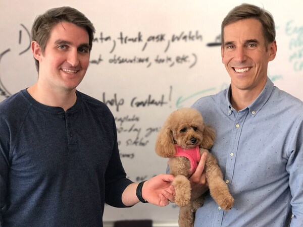 Scratchpay co-founders Caleb Morse (left) and John Keatley (right), and resident office poodle, Penny (center)
