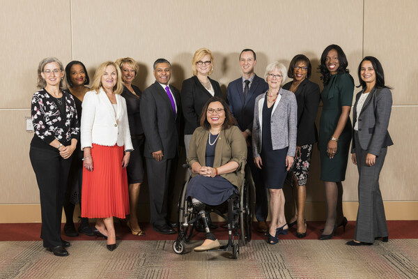 Sen. Tammy Duckworth (center) is joined by Melissa Gonzales, executive vice president of the Americas for Medela LLC (fourth from left), Matt Keppler Regional Director of Advocacy and Government Affairs, March of Dimes (fifth from right), and leading maternal and infant health experts to discuss solutions for maternal and infant mortality rates in the Chicago area.