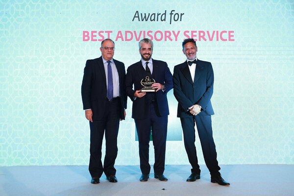 Mr. Omar Al-Gharabally (center), President and Partner of Greenstone Equity Partners, accepting the “Best Advisory Service” award from executives of CPI Financial.