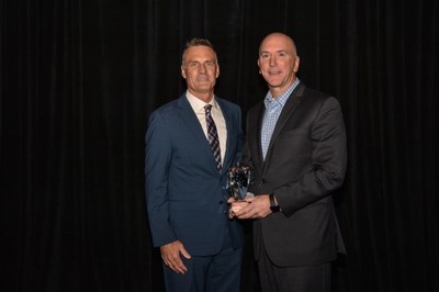 Digi-Key president and chief operating officer Dave Doherty receives the ECIA North Star Award from Bill Bradford, ECIA chief operating officer during the ECIA annual Executive Conference in Chicago.