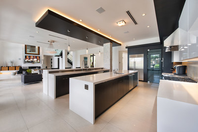 Don’t be fooled by its sleek design. The kitchen is equipped to please the gourmet chef while also serving as an excellent hub for entertaining. WaterfrontLuxuryAuction.com.