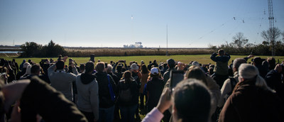 A crowd watches from a safe distance as Northrop Grumman launches its 12th cargo resupply mission to the International Space Station from Pad-0A of NASA's Wallops Flight Facility in Virginia Nov. 2, 2019. Credits: NASA/Bill Ingalls