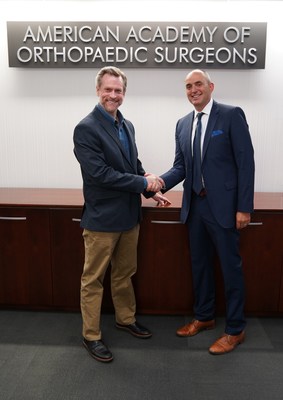 Pictured here: Tom Arend (AAOS) and Gregory Pierce (CareCredit)