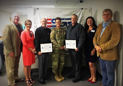 Paul Christianson (award on left) and Mark Hendricks (award on right) being honored with the ESGR Patriot Award